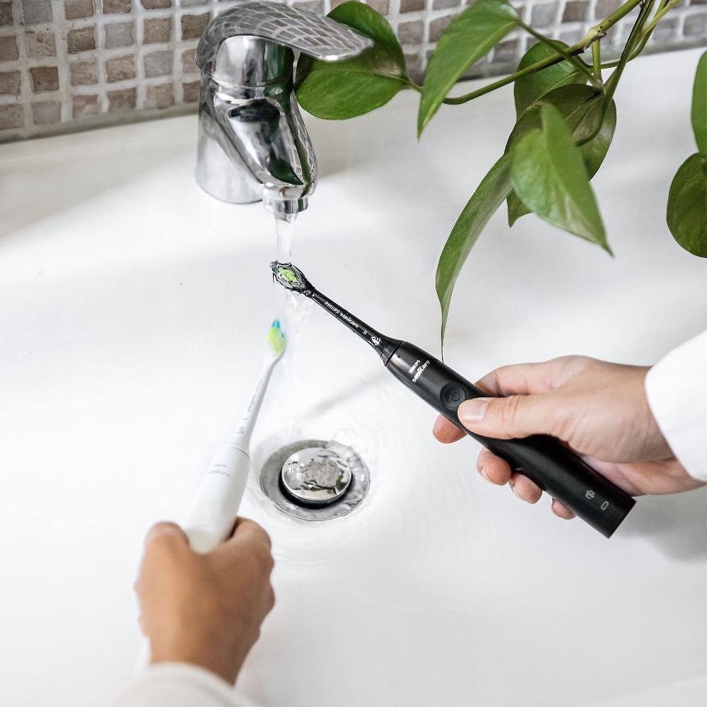 QVC Philips Spazzolino elettrico Serie 4100 + 5 testine di ricambio Sconti VIP
